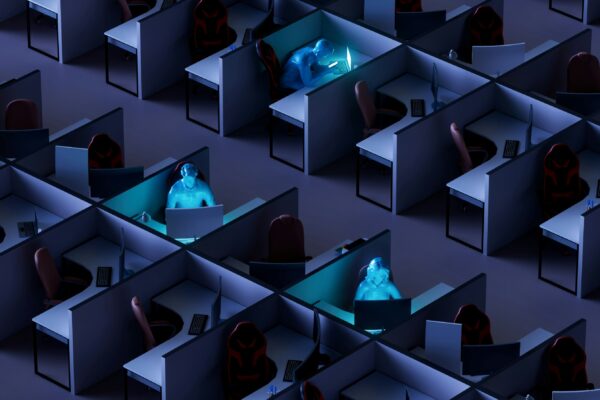 Dimly lit office with isolated workers, clearly overworked