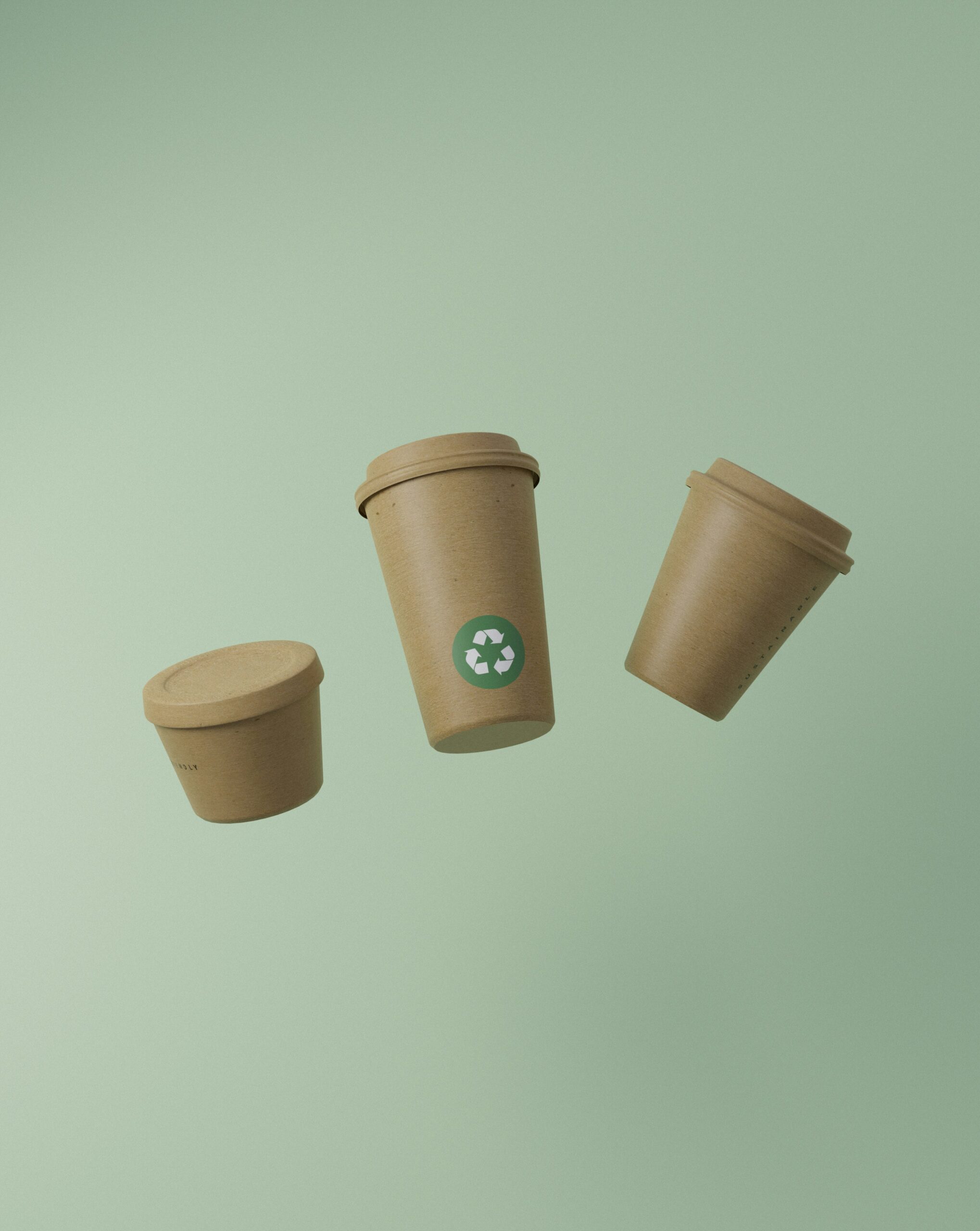 Three recyclable or biodegradable packaging coffee cups displayed