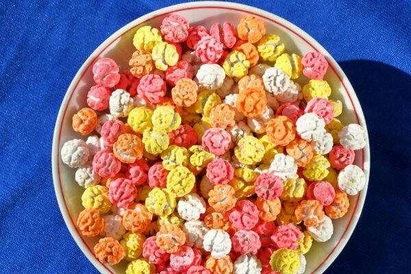 Colorful bowl of popcorn-like food snacks