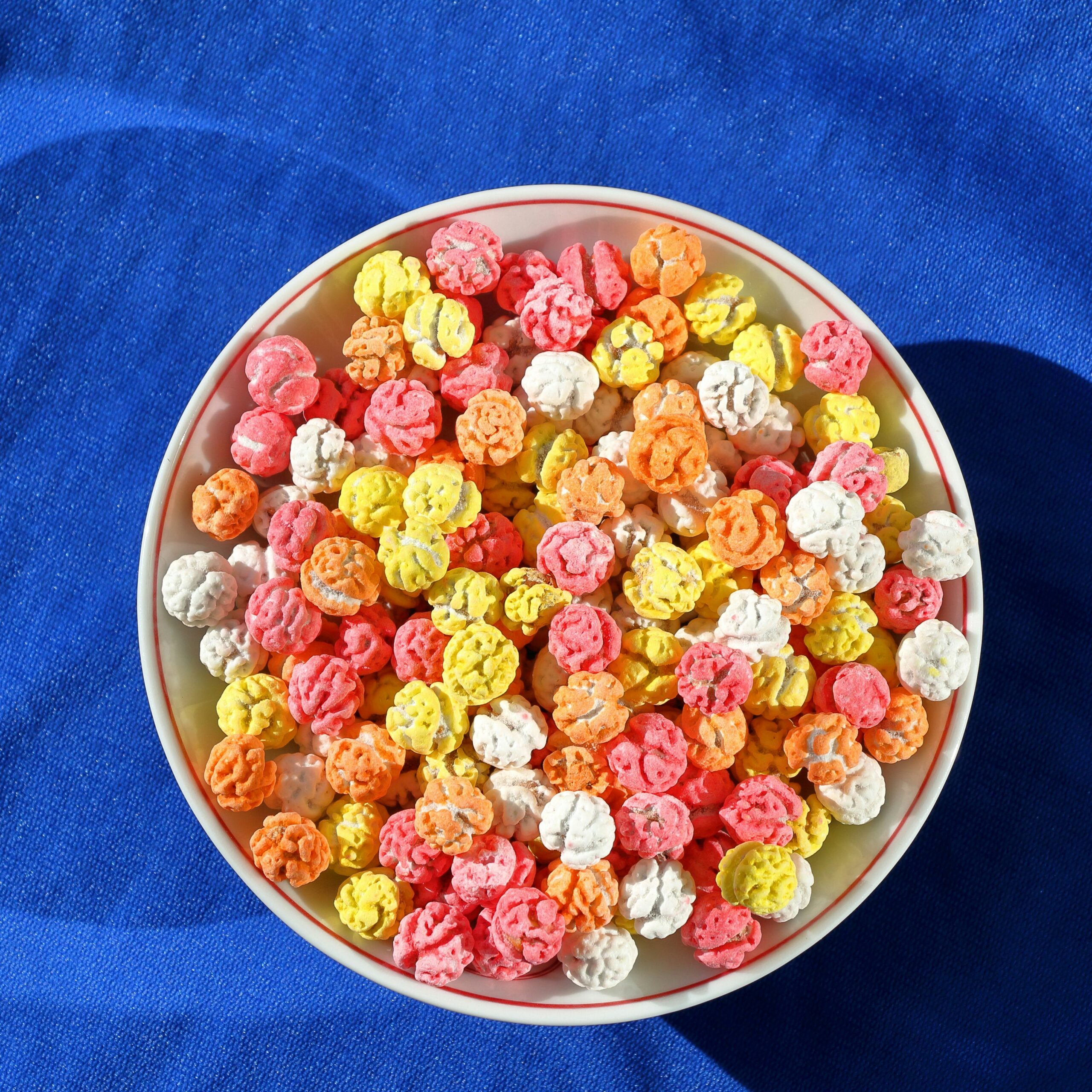 Colorful bowl of popcorn-like food snacks