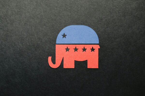Red elephant with blue hat design, a symbol of the republican party as we talk about what they are doing to education and why