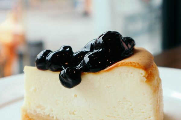 a slice of cheesecake set to represent the slice of the pie labor makes up