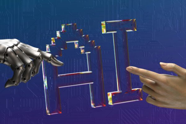 Robot and human hands touching AI, a metaphor of how AI is Reshaping careers